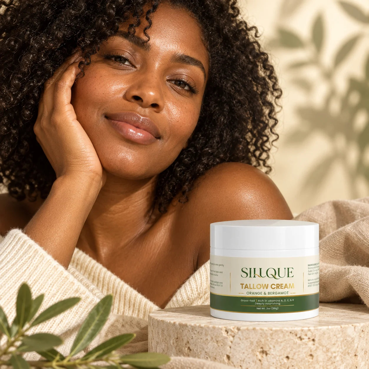 Sillque Tallow Cream beside a woman with naturally comfortable-looking skin